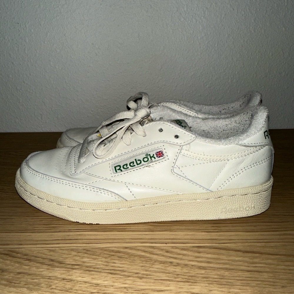 Classic cream reebok sneaker w/ red and green